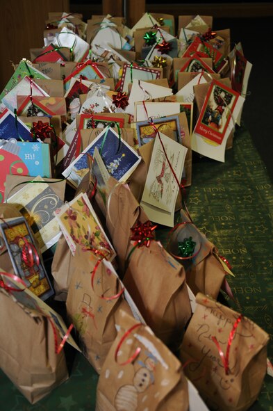 Bags of cookies await delivery Dec. 18, 2012, at the base chapel, RAF Mildenhall, England. The cookies will be delivered to Airmen living in the dorms on base to bring them holiday cheer. (U.S. Air Force photo by Airman 1st Class Dillon Johnston/Released)