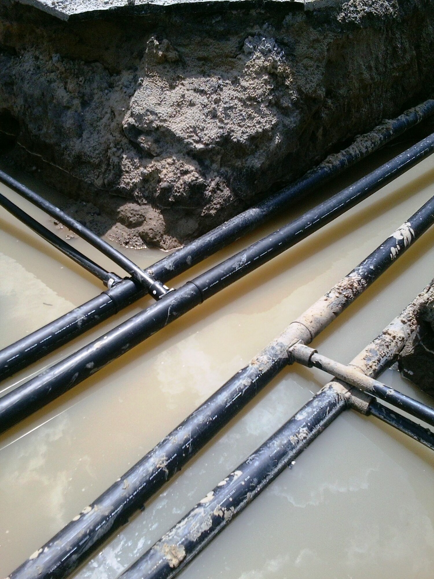 Pipes for a geoexchange system are buried 400 feet below the Earth’s surface at Langley Air Force Base, Va. These pipes will be buried beneath two of the largest parking lots on the Air Combat Command campus, as well as next to the Langley Marina – making these parking spaces unusable while the wells are being drilled. (U.S. Air Force courtesy photo/Released)