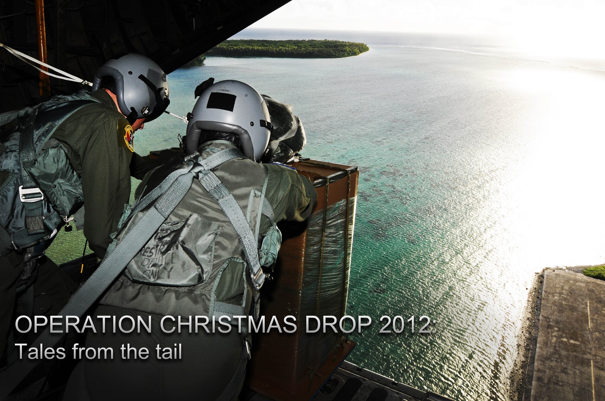 C-130 loadmasters from the 36th Airlift Squadron, Yokota Air Base, Japan, begin air drop delivery of a pallet over Mokil Island as part of Operation Christmas Drop 2012, Dec. 12, 2012. Each year OCD provides aid to more than 30,000 islanders in Chuuk, Palau, Yap, Marshall Islands and Commonwealth of the Northern Mariana Islands. This year is the 61st anniversary of OCD, making it the longest running humanitarian mission in the world. In total, there are eight planned days of air drops, with 54 islands scheduled to receive humanitarian aid. (U.S. Air Force photo/Senior Airman Carlin Leslie/Released)
