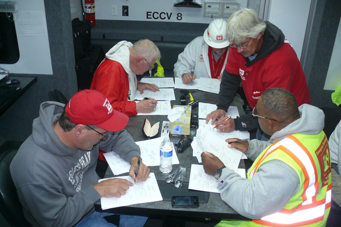 A U.S. Army Corps of Engineers command and control team coordinates a power generator mission for the Philadelphia District Nov. 4, 2012 at Lakehurst Naval Air Station, N.J. (USACE photo by Tim Rochelle)