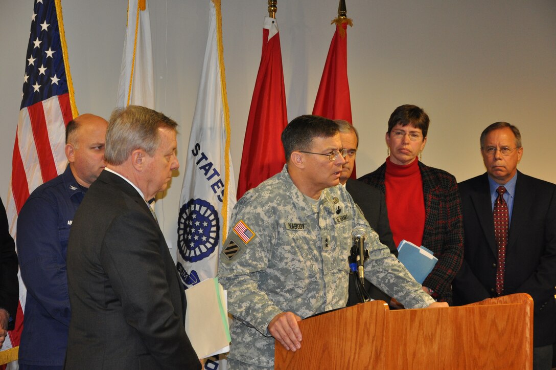 The U.S. Army Corps of Engineers Mississippi Valley Division Commander Maj. Gen. John Peabody (at podium) and St. Louis District Commander Col. Chris Hall met with state and local representatives Dec. 18, 2012, in Alton, Ill., to discuss current and future actions the Corps will take to maintain a safe and reliable navigation channel during low water.  The meeting, which was led by Sen. Dick Durbin (D-Ill.), was also attended by Capt. Byron Black, U.S. Coast Guard commander of the Upper Mississippi River Sector, Rep. Jerry Costello (D-Ill.), Rep. John Shimkus (R-Ill.), Lt. Gov. Sheila Simon (D-Ill.) and river industry representatives.
