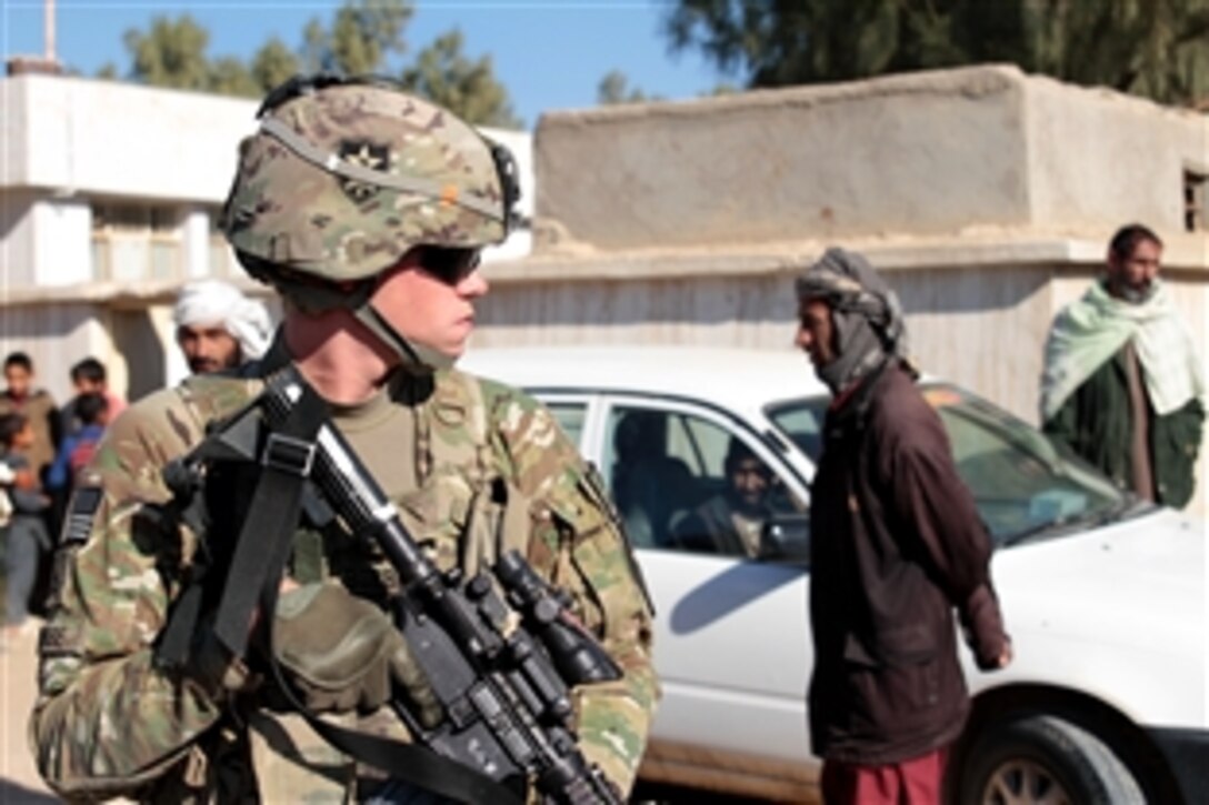 U.S. Army Spc. Jacob Bobbe maintains security during a key leader engagement in the Lash-e Juwayn district in Afghanistan's Farah province, Dec. 11, 2012. Bobbe is assigned to Provincial Reconstruction Team Farah.