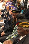 A row of veterans sit at the front of a meeting of the Jacksonville, N.C., City Council, where the city recognized them for their outstanding contributions to the local community Nov. 20, 2012. Jacksonville Mayor Sammy Phillips presented each of the 30 nominees with a plaque to commemorate the city’s appreciation of their continued service to the community. 