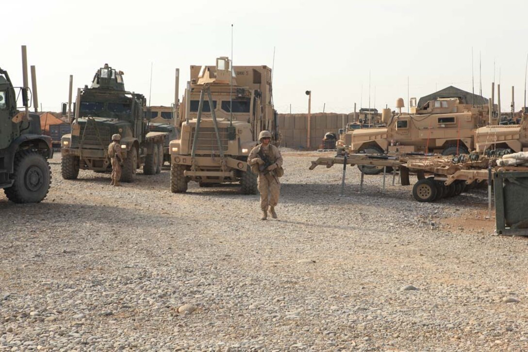 Marines with the motor transport section of Headquarters and Service Company, 2nd Battalion, 7th Marines, Regimental Combat Team 7, prepare to conduct a convoy operation through the Sangin district of Afghanistan, Dec. 16, 2012. The motor transport section is responsible for delivering nearly three million pounds of supplies in approximately three months to units throughout their area of operations.