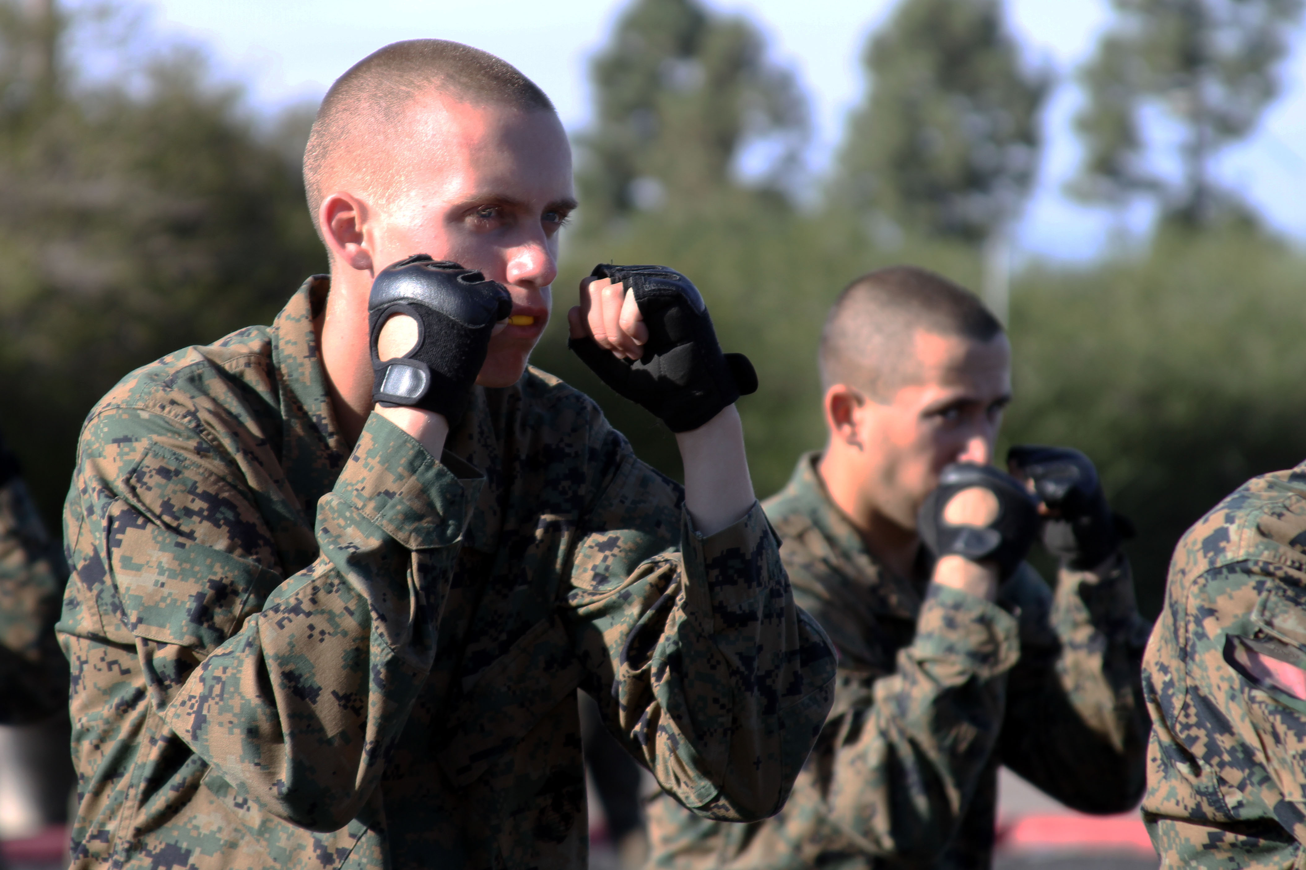 Recruits of Company D, 1st Recruit Training Battalion, execute a