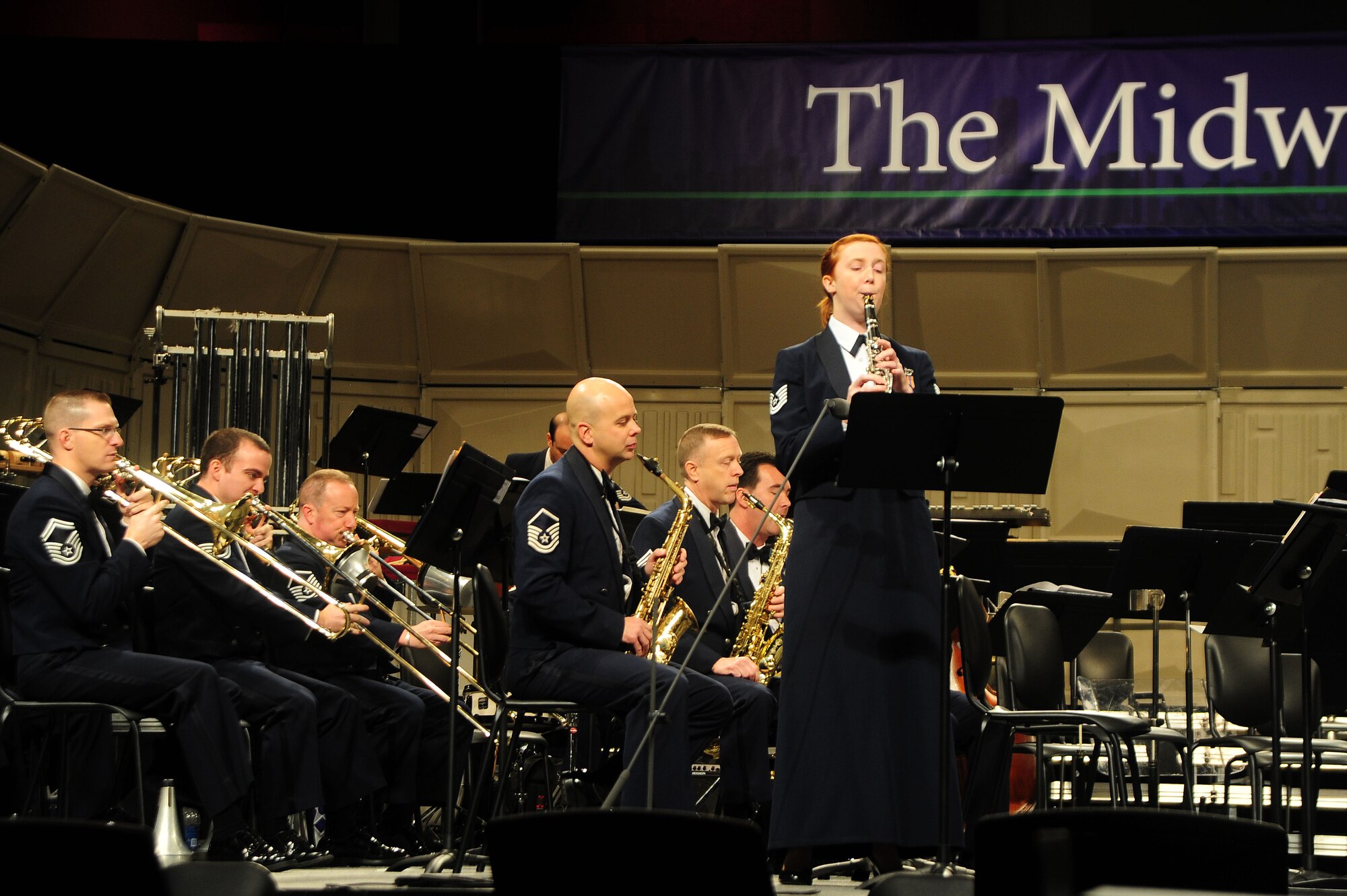 U.S. Air Force Band Clarinetist Tech. Sgt. Kristin King performs a solo piece at the 66th Annual Midwest Clinic, Dec. 19, in Chicago, Ill. "I was able to perform for my high school band director in the audience as well as my parents, grandpa and several students that I've taught here in Chicago which was really special for me," said King. "It's a dream job to play alongside so many other wonderful professional musicians for amazing audiences here, in Washington, D.C., and across the country; it is just a fantastic experience." (U.S. Air Force photo by Senior Airman Steele C. G. Britton)