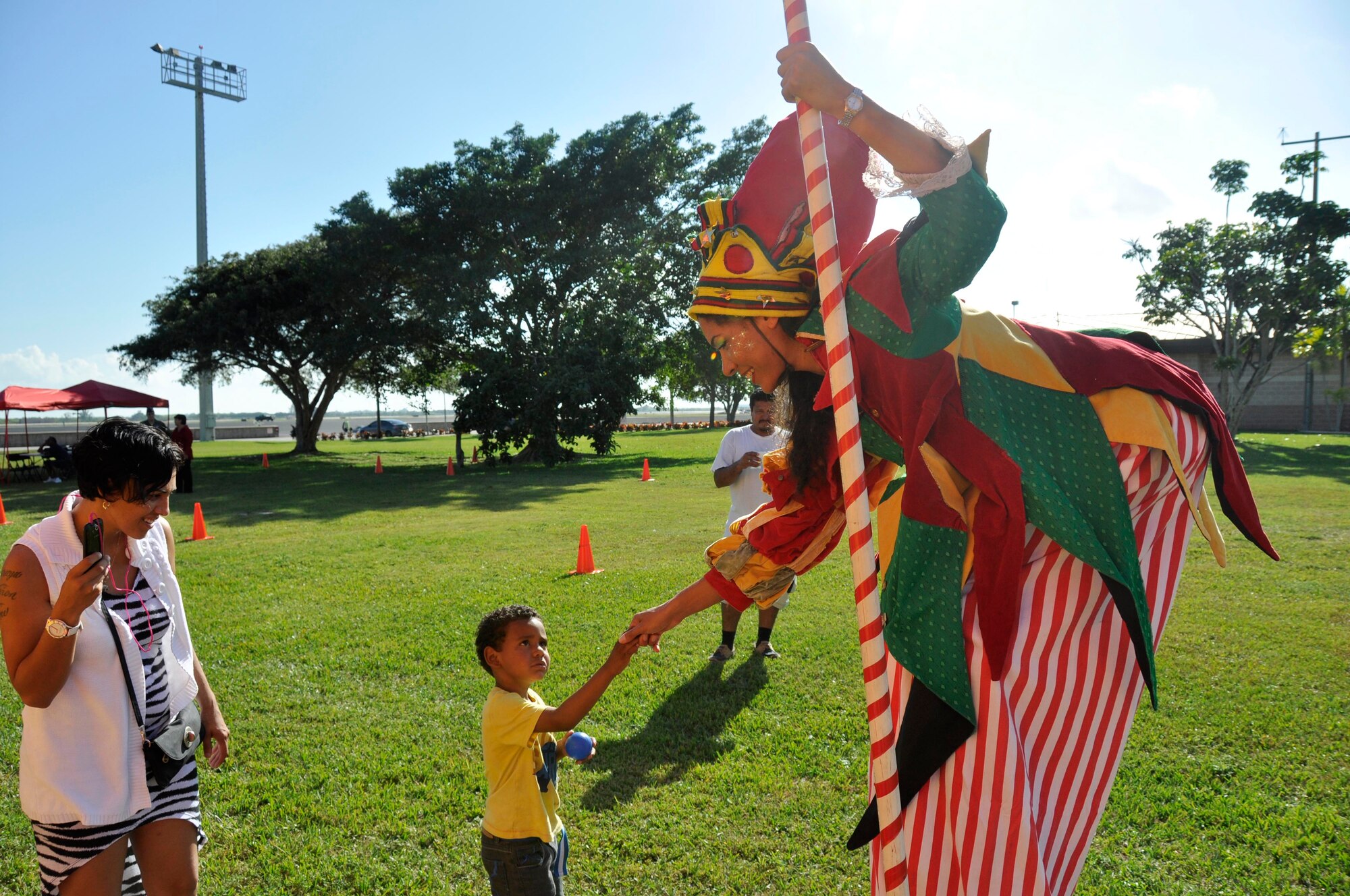 Santa Claus greets children involved with Chapman Partnership after arriving in an F-16 at Homestead Air Reserve Base, Fla., Dec. 19. Chapman Partnership, a local organization helping to combat homelessness, provides comprehensive services to empower homeless residents to become self-sufficient. Homestead ARB has also participated with Chapman Partnership on other events such as food drives. (U.S. Air Force photo/Senior Airman Jacob Jimenez)