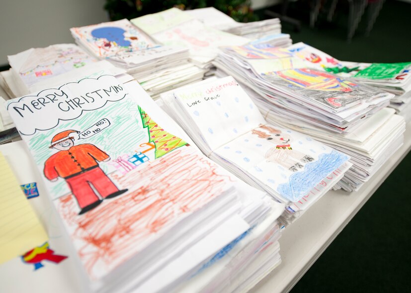 More than 1,200 cookies bags lay ready for filling during the preparations for the annual Commando Cookie Drop on Hurlburt Field, Fla., Dec. 17, 2012. The bags were decorated by local elementary school students and were used to deliver more than 15,000 cookies to young Airmen throughout the base. (U.S. photo by Senior Airman Kentavist P. Brackin)
