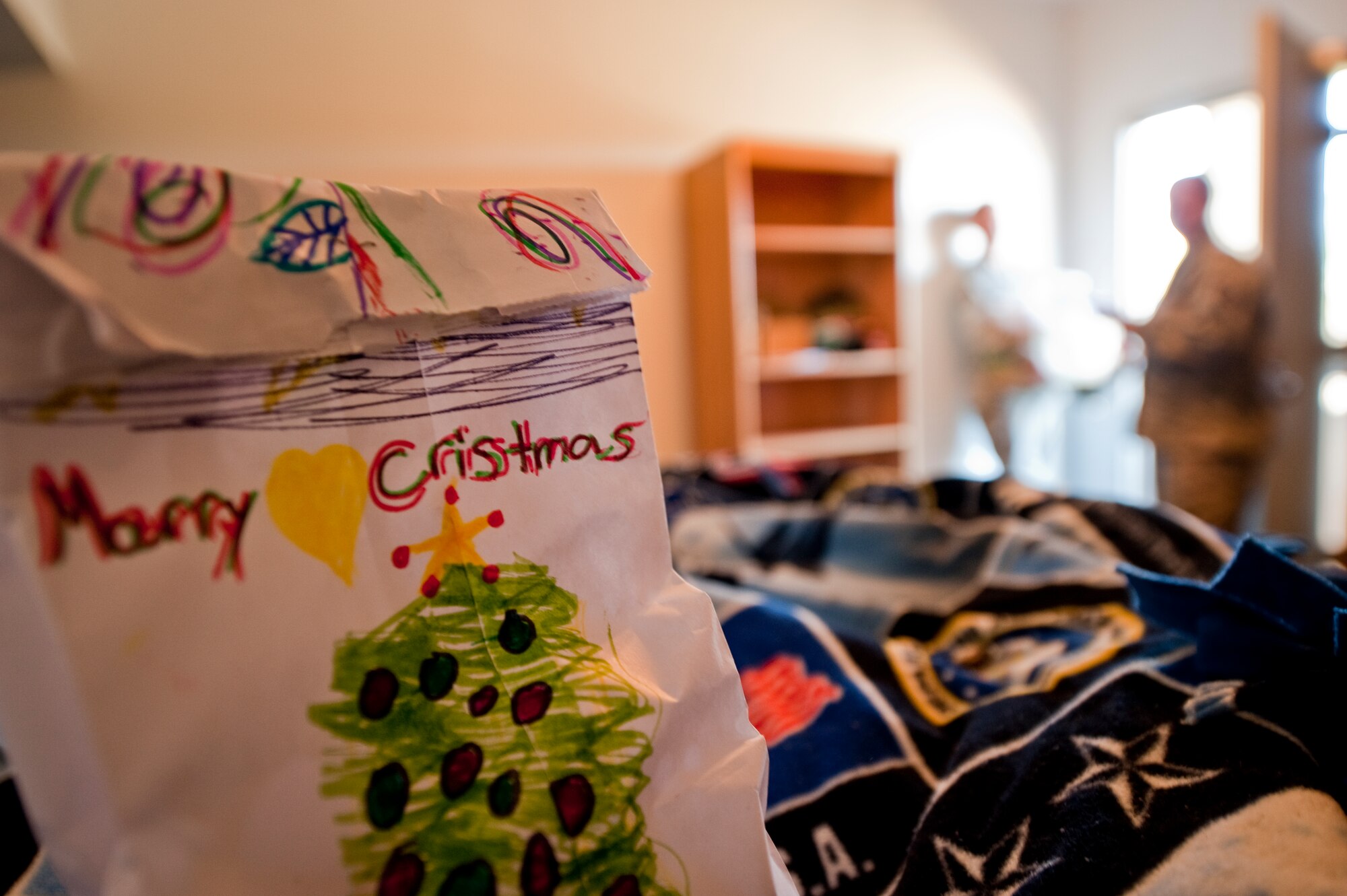 Cookie bags were placed on beds, tables, and under Christmas trees of single Airmen during the annual Commando Cookie Drop on Hurlburt Field, Fla., Dec. 17-18, 2012. First segerants of various units throughout Hurlburt Field briefly took on the role of Santa Claus during the event to deliver holiday treats to Hurlburt personnel who reside in the dormitories. (U.S. photo by Senior Airman Kentavist P. Brackin)