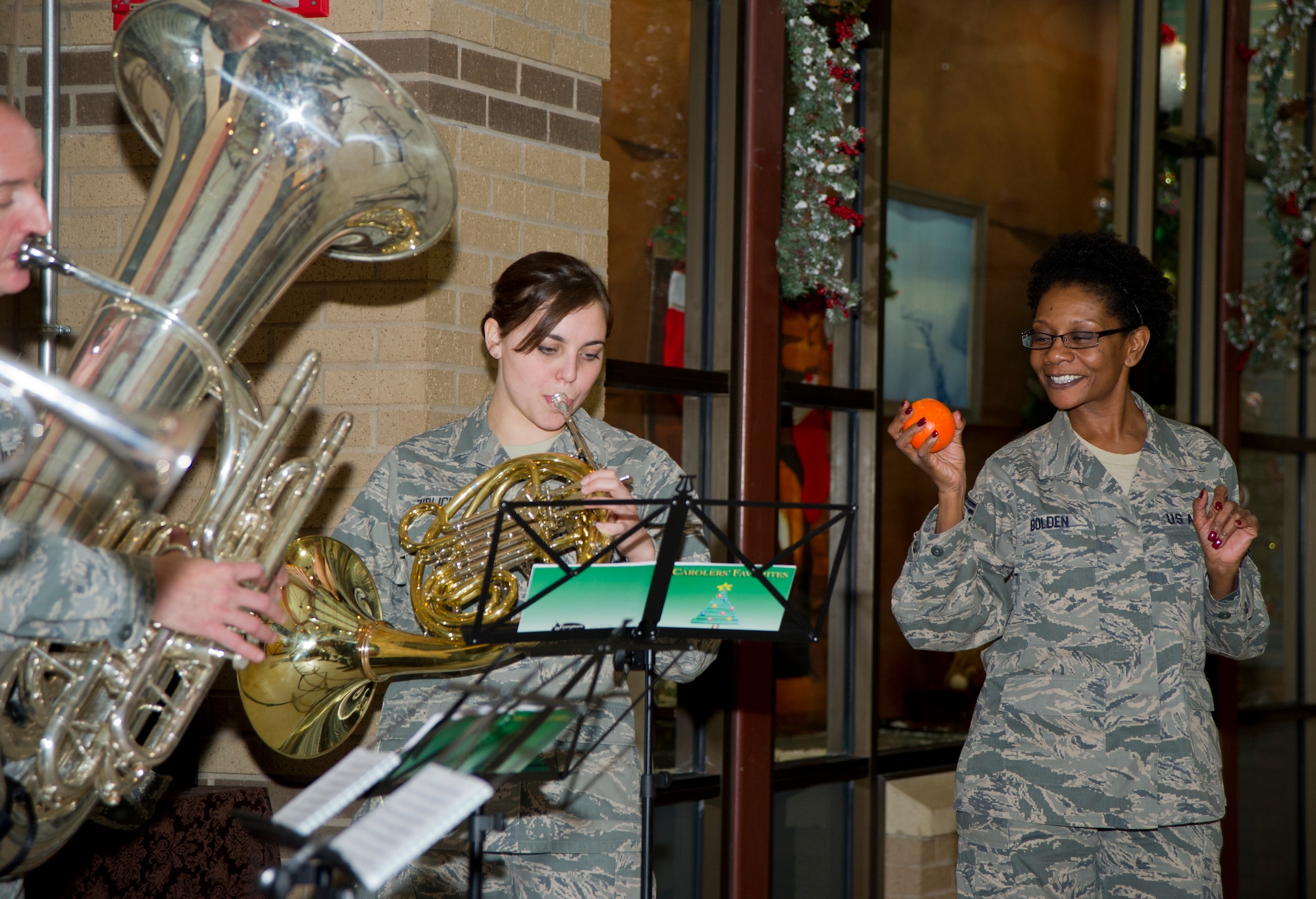 Airmen from the Heartland of America Band perform at the child development center Dec. 19, 2012, McConnell Air Force Base, Kan. The band performed for the 22nd Air Refueling Wing, Air Force Reserve 931st Air Refueling Group and Air National Guard’s 184th Intelligence Wing. (U.S. Air Force photo/Senior Airman Armando A. Schwier-Morales)