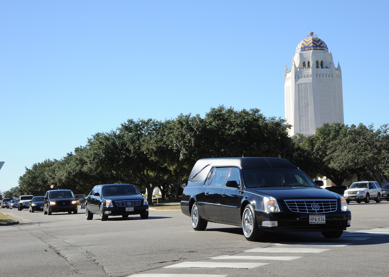 A motorcade transports the remains of retired Col. Ralph Parr Dec. 17 from the funeral service at Joint Base San Antonio-Randolph to the graveside service at Fort Sam Houston National Cemetery. (U.S. Air Force photo by Melissa Peterson)
