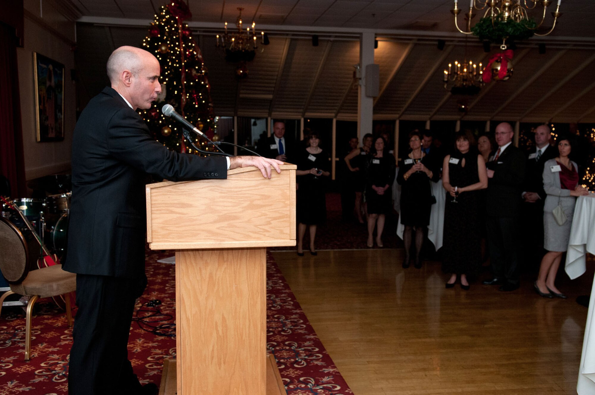 HANSCOM AIR FORCE BASE, Mass. -- Col. Lester A. Weilacher, 66th Air Base Group commander, talks about what the holiday season means to him at the Team Hanscom Holiday Social at the Minuteman Commons Dec. 15. The event was a chance for Hanscom personnel, local community leaders and industry partners to enjoy food and entertainment while socializing with one another. (U.S. Air Force photo by Rick Berry)