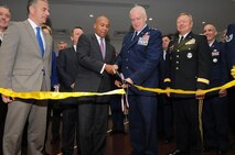 HANSCOM AIR FORCE BASE, Mass. – Gov. Deval Patrick and Maj. Gen. L. Scott Rice, The Adjutant General, Massachusetts National Guard, cut a ribbon signifying the official opening of the Massachusetts National Guard’s new Joint Force Headquarters here Dec. 13. Sen.-elect Elizabeth Warren, Gen. Frank J. Grass, National Guard Bureau chief, Lt. Gov. Tim Murray, state cabinet members and base leadership all attended the ceremony to officially welcome the guard to Hanscom. (U.S. Army photo by Staff Sgt. Jerry Saslav, Massachusetts National Guard Public Affairs)