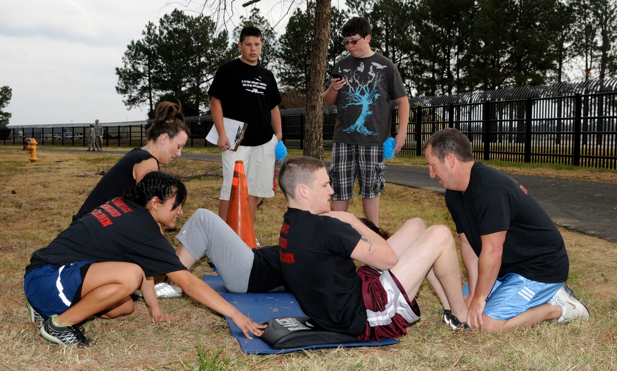 Airmen with the 188th Fighter Wing participate in a fitness competition as part of a dedication for the unit’s new track facility during a unit training assembly Dec. 1. (National Guard photo by Amn Cody Martin/188th Fighter Wing Public Affairs)