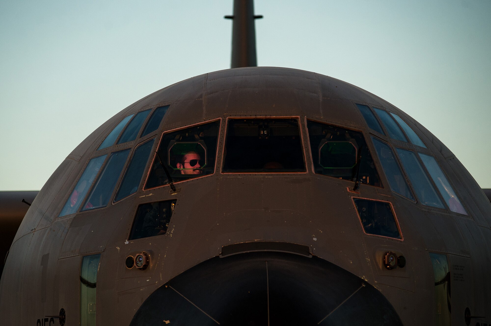 U.S. Air Force 1st Lt. John Fugate, 772nd Expeditionary Airlift Squadron pilot, conducts a pre-flight check on a U.S. Air Force C-130J Super Hercules Dec. 2, 2012, at Kandahar Airfield, Afghanistan. The 772nd EAS provides tactical airlift, airdrop and aeromedical evacuation, creating an air bridge for personnel, equipment and supplies. Fugate's hometown is DuBois, Pa. (U.S. Air Force photo/Staff Sgt. Jonathan Snyder)