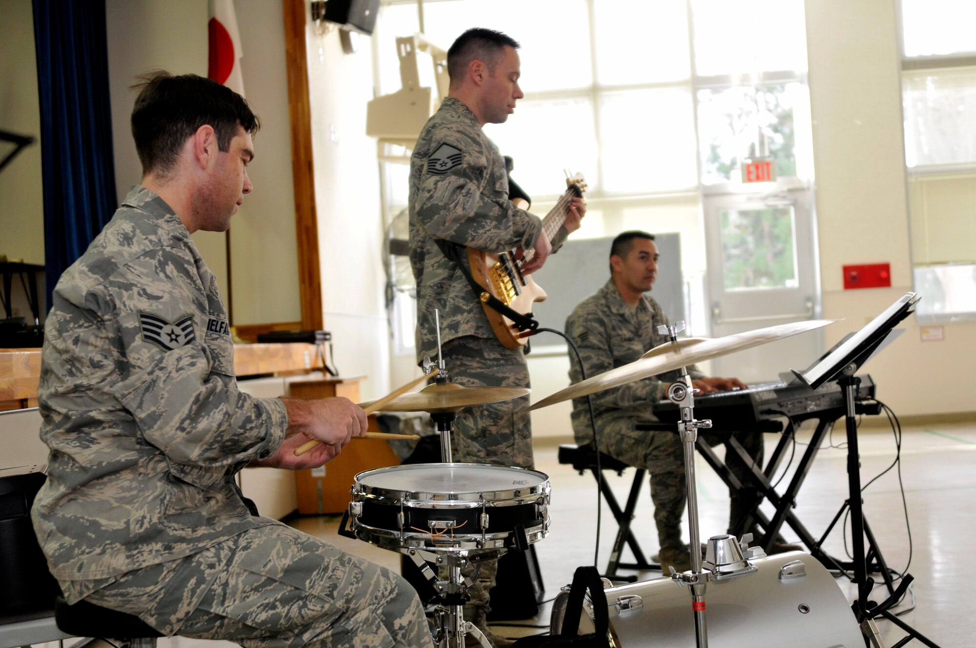 Members of the U.S. Air Force Band of the Pacific-Asia Jazz Combo play an arrangement of Christmas songs for children at Sollars Elementary School Dec. 10, 2012, Misawa Air Base, Japan.  The band didn’t just play for on-base children, they also visited two schools in Misawa City. (U.S. Air Force photo by Tech. Sgt. Phillip Butterfield)