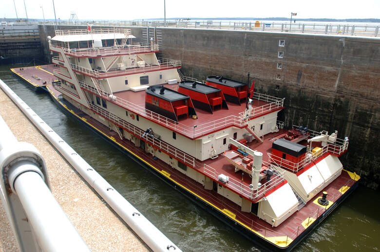 The Motor Vessel Mississippi locks through Kentucky Lock in Kuttawa, Ky., Aug. 11, 2011.  The vessel carried the Mississippi River Commission, which toured Kentucky Lock and the Lake Barkley Hydropower Plant during a low-water inspection trip on the Ohio River that included these U.S. Army Corps of Engineers Nashville District projects.