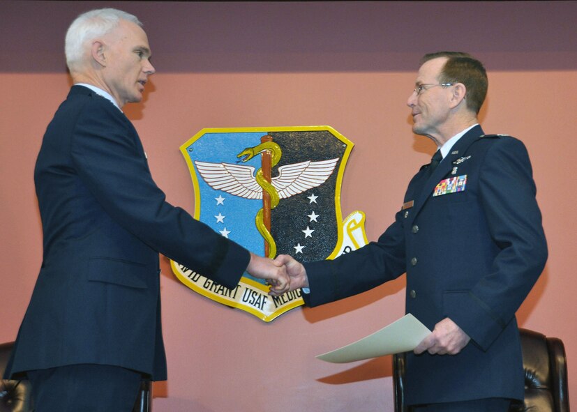 TRAVIS AIR FORCE BASE, Calif. -- Dr. (Col.) Robert Singler, retires as the 349th Medical Group Commander at a ceremony held at David Grant Medical Center, Travis AFB, Dec. 16th. (U.S. Air Force photo / Master Sgt. Robert Wade)
