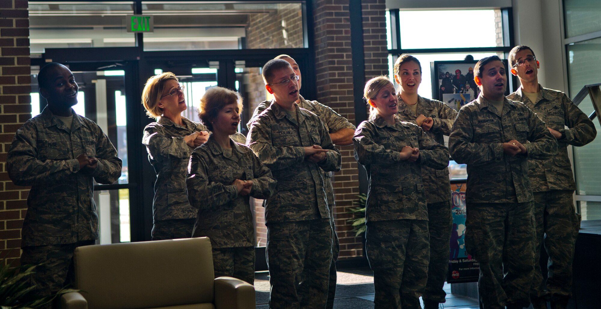 The United States Air Force Band Singing Sergeants sing holiday carols for Air Force District of Washington Airmen at Joint Base Andrews, Md. Dec. 18, 2012. (U.S. Air Force photo by 1st Lt. Ashleigh Peck)