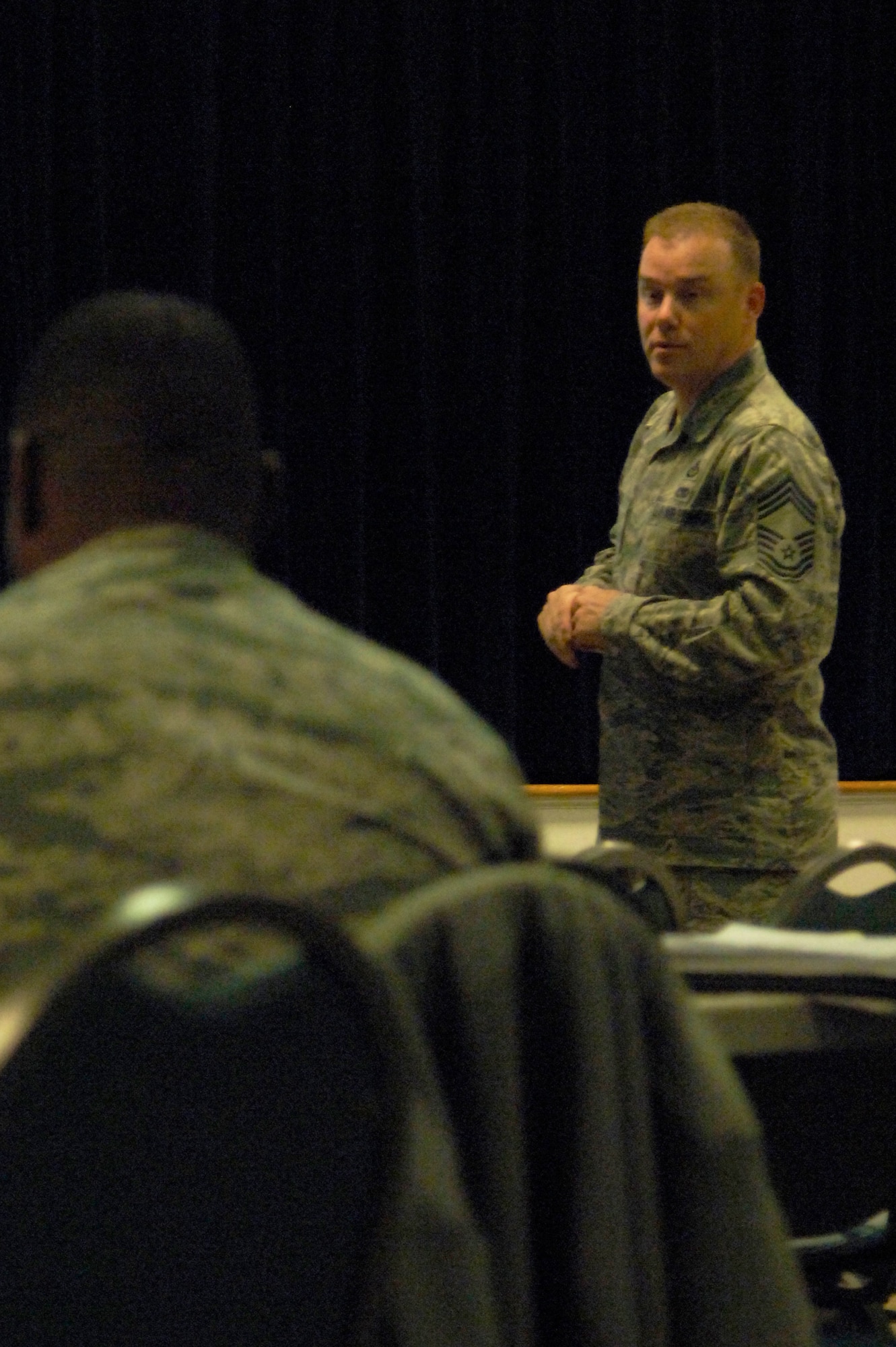 U.S. Air Force Chief Master Sgt. Dan Oien, treasurer of the Langley Chiefs Group, discusses future budget plans during the LCG meeting at Langley Air Force Base, Va., Nov. 16, 2012. The meetings are held once a month for retired, active duty and reserve chiefs who are official members of the group. (U.S. Air Force photo by Airman First Class Victoria Taylor/Released)