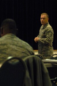 U.S. Air Force Chief Master Sgt. Dan Oien, treasurer of the Langley Chiefs Group, discusses future budget plans during the LCG meeting at Langley Air Force Base, Va., Nov. 16, 2012. The meetings are held once a month for retired, active duty and reserve chiefs who are official members of the group. (U.S. Air Force photo by Airman First Class Victoria Taylor/Released)