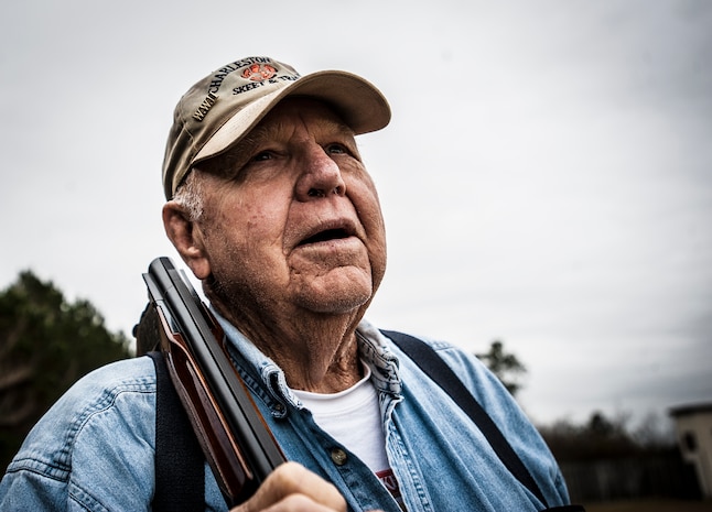 Lee Hunt, Joint Base Charleston Skeet and Trap Range volunteer, watches attendees shoot during a round of skeet Dec. 15, 2012, at JB Charleston – Air Base. Hunt started the range after his service in the Navy, and at 86-years old, he still helps run the range as a volunteer. (U.S. Air Force photo/ Senior Airman Dennis Sloan)