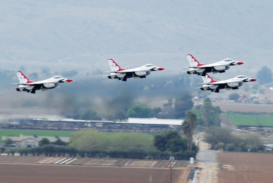 The U.S. Air Force Thunderbird Aerial Demonstration Team F-16 Fighting Falcons take off at the Luke Days 2011 Open House March 20, 2011. The team is scheduled to return to Luke Air Force Base March 16 and 17 for the 2013 Luke Days Open House.(Courtesy photo)