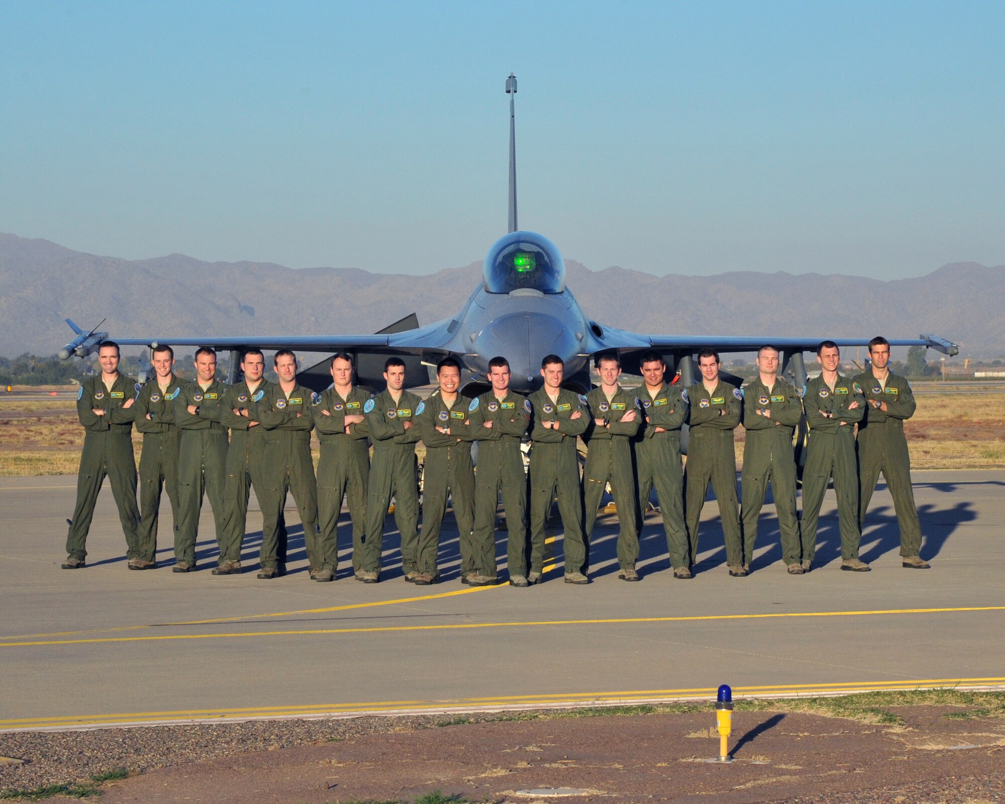The 310th Fighter Squadron Top Hats will graduate 16 pilots Jan. 4, 2013. They are, from left, Capt. James Collins, 1st Lt. Paul Baker, Capt. Nate Hofmann, 1st Lt. Cayce Wilkins, Capt. Scott Smit, 1st Lt. Clay Shaner, Capts. Branden Felker and Brandon Nauta; and 1st Lts. Charlie Hood, William Baker, Steven McCord, Capt. Anthony Quirarte; 1st Lt. Justin Phillips, Capt. Matthew Sabraw, 1st Lt. Josh Fellegy and Capt. Jason Getz. (U.S. Air Force photo/Senior Airman Sandra Welch)