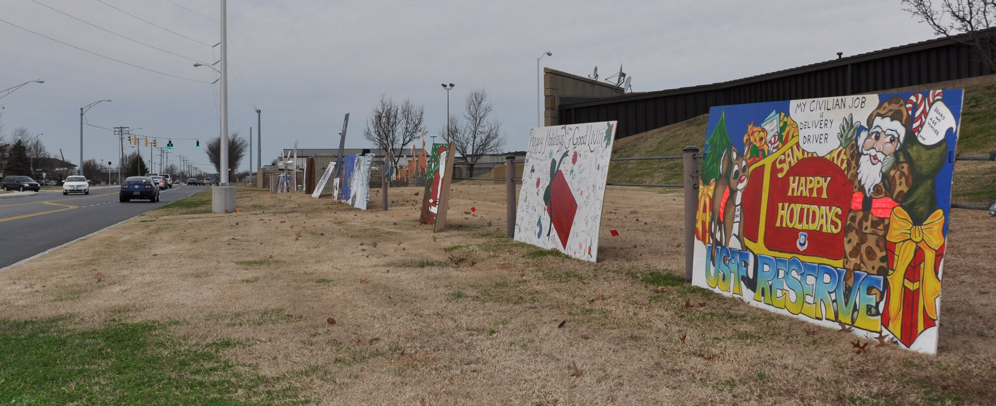 Holiday cards created by members of the 512th and 436th Airlift Wings, Dover Air Force Base, Del., are on display on base Dec. 20, 2012. Eighteen cards competed for first, second and third place honors. (U.S. Air Force photo/Senior Airman Joe Yanik)