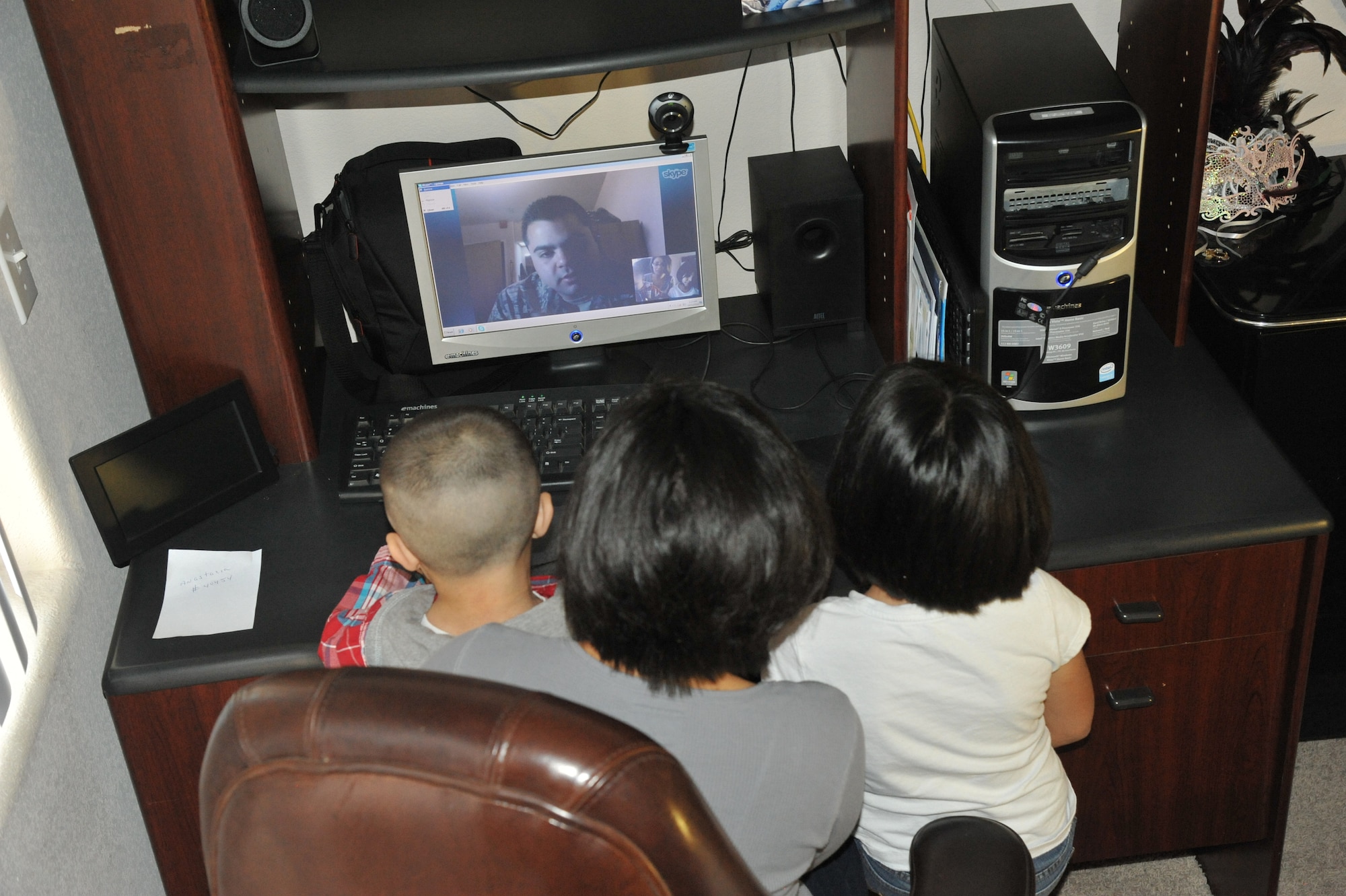 Staff Sgt. Eduardo Madera-Muniz, 8th Aircraft Maintenance Unit, communicates via Skype with his family before work Dec. 11 from Kunsan Air Base, Republic of Korea. Madera-Muniz has been assigned to Kunsan for seven months. (U.S. Air Force photo/Senior Airman Kate Vaughn)