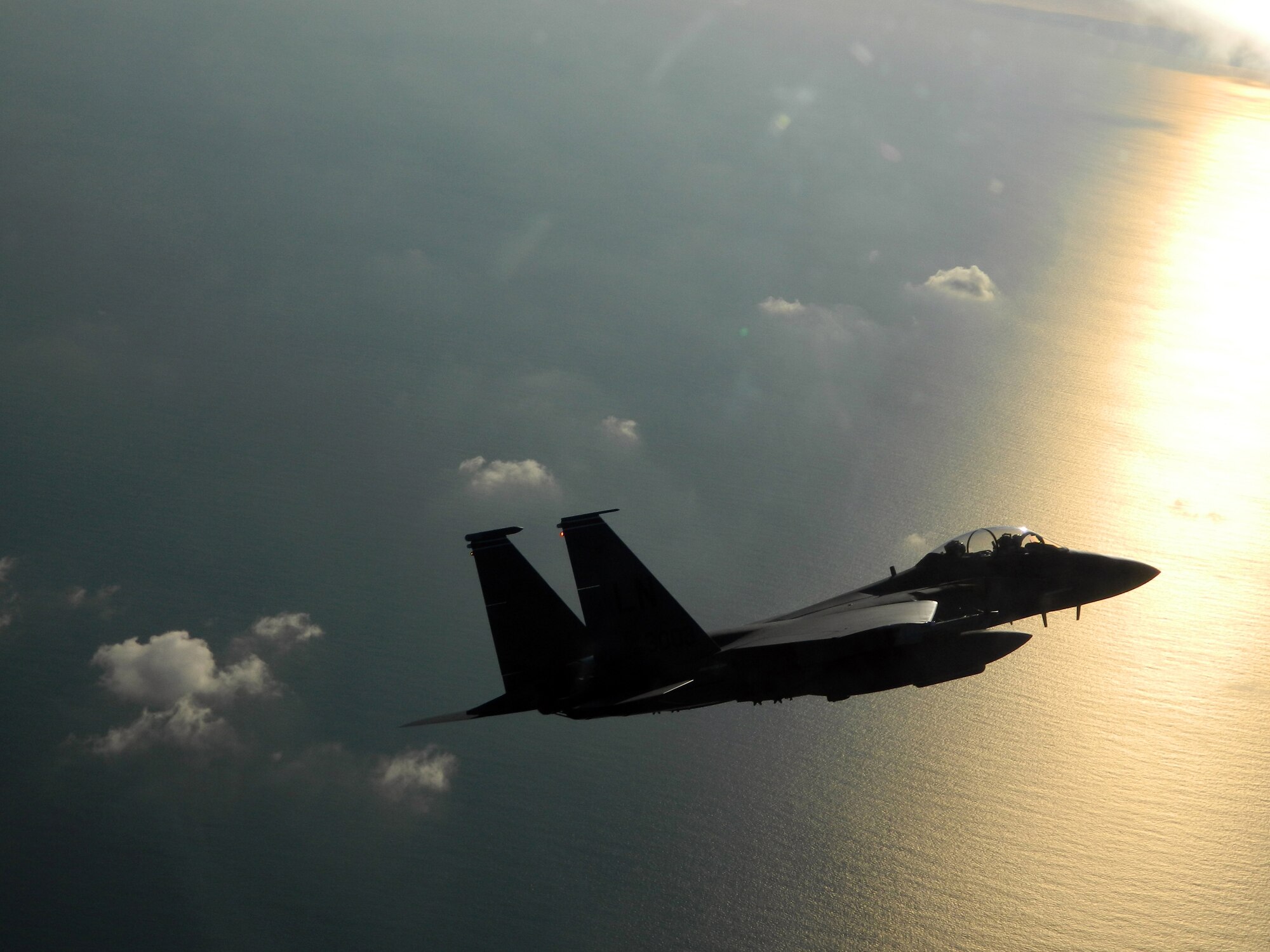 ROYAL AIR FORCE LAKENHEATH, England -- An F-15E Strike Eagle from the 48th Fighter Wing flies over the North Sea after an aerial refueling during an exercise Dec. 13, 2012. The Liberty Wing recently teamed up with the Royal Air Force for the exercise to prepare the 492nd Fighter Squadron for Red Flag -- Nellis in 2013, which is an exercise that provides a peacetime "battlefield" for combat air forces to train. (Courtesy photo)
