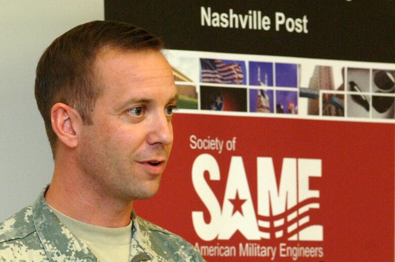 Lt. Col. James A. DeLapp, U.S. Army Corps of Engineers Nashville District commander, comments after being installed as president of the Society of American Military Engineers Nashville Post during a meeting Dec. 14, 2011 in the Tennessee Engineering Center at the Adventure Science Center in Nashville, Tenn. (USACE photo by Lee Roberts)