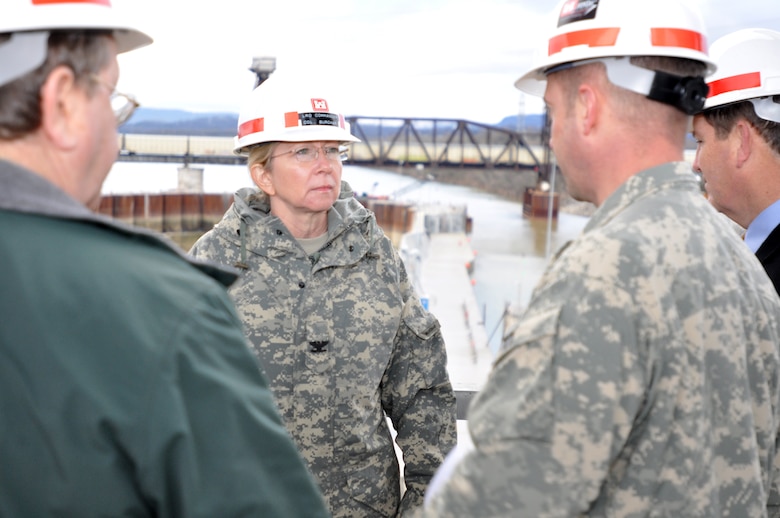 Col. Margaret W. Burcham, U.S. Army Corps of Engineers Great Lakes and Ohio River Division commander,receives a briefing from Lt. Col. James A. DeLapp, Nashville District commander, and other project experts on site at the coffer dam at Chickamauga Lock in Chattanooga, Tenn., Jan. 12, 2012. (USACE photo by David Wheeler)