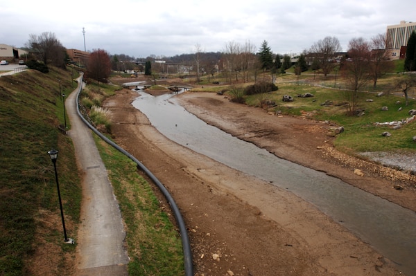 Greenbelt Lake in Maryville, Tenn., is drying up Feb. 29, 2012.  The U.S. Army Corps of Engineers Nashville District is working to divert water from two streams that enter the lake in order to remove sediment as part of an aquatic and ecosystem restoration project. (USACE photo by Leon Roberts)