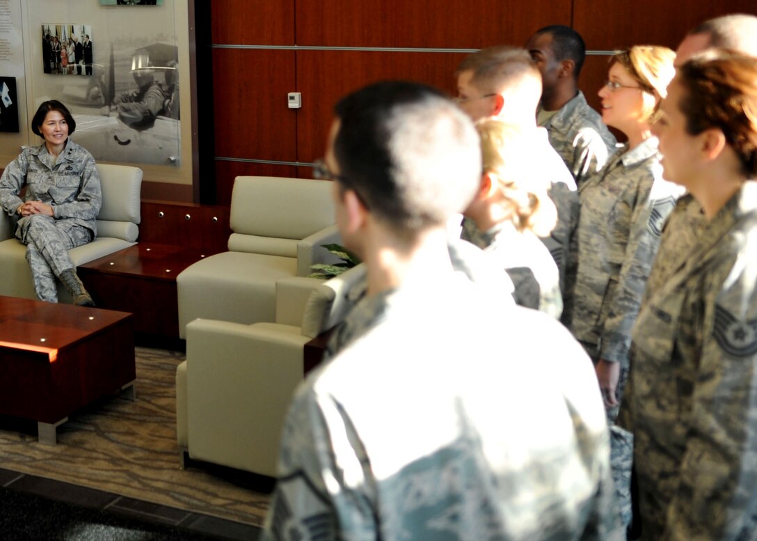 Air Force District of Washington Commander Maj. Gen. Sharon K.G. Dunbar listens while the United States Air Force Band Singing Sergeants sing holiday carols for AFDW Airmen at Joint Base Andrews, Md. Dec. 18, 2012. (U.S. Air Force photo by 1st Lt. Ashleigh Peck)