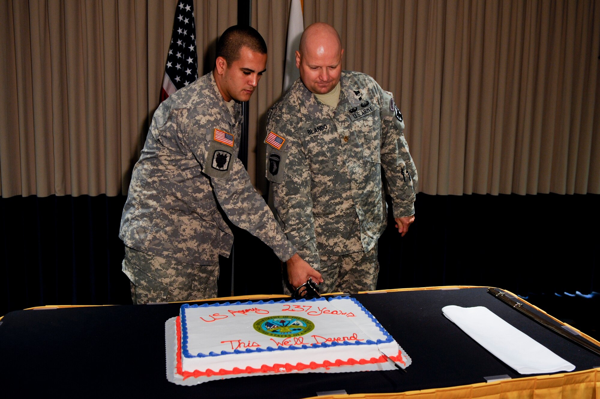 VANDENBERG AIR FORCE BASE, Calif. -- Army Sgt. Daniel Pineda, a Joint Space Operation Center space communications technician, and Maj. Craig Blando, a Joint Function Component Command Space plans officer, cut the cake during the 237th Army Birthday Celebration at the Pacific Coast Club here Thursday, June 14, 2012. Founded in 1775, the U.S. Army has grown from an amateur force of colonial freedom fighters to a professional force of more than one million solders fighting terrorism worldwide and providing support for international operations. (U.S. Air Force photo/Staff Sgt. Levi Riendeau)