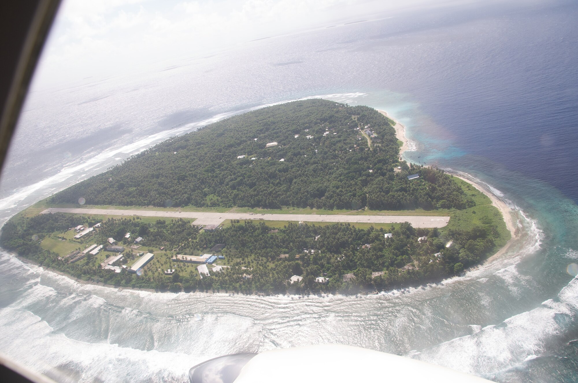 Aerial view of the island of Falalop, one of the islands in Micronesia, 2011. Master Sgt. Cameron Leslie spent two weeks operating out of the island to visit other islands in the area to learn about Operation Christmas Drop from the islanders' perspective. (Courtesy photo by Master Sgt. Cameron Leslie)