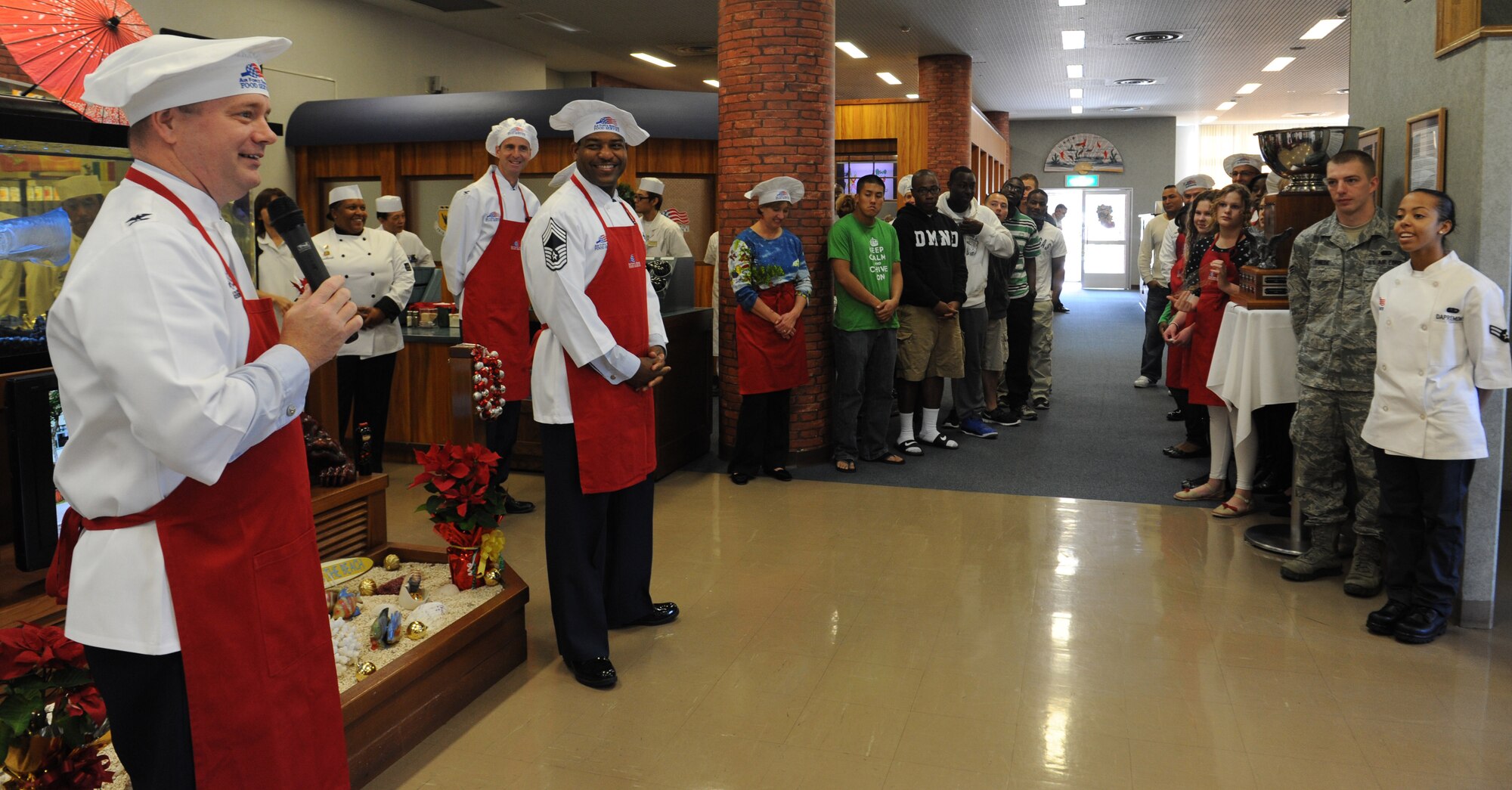 U.S. Air Force Col. Brian McDaniel, 18th Wing vice commander, gives the opening remarks for the Christmas meal at the Marshall Dining Facility on Kadena Air Base, Japan, Dec. 25, 2012. Kadena's leadership served various dishes to Airmen, Marines and Soldiers for the holidays. (U.S. Air Force photo/Airman 1st Class Malia Jenkins)  