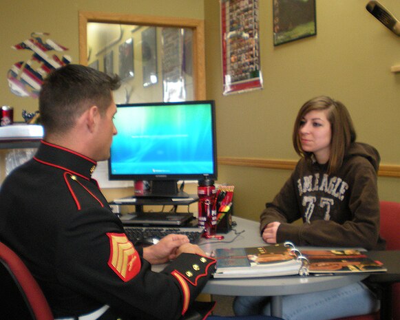 Poolee Rose Wilson talks with Sgt. Timothy A. Riffe, a recruiter at Recruiting Sub- Station Rochester, about the oppurtunities availble in the Marine Corps. Photo courtesy RSS Rochester.     