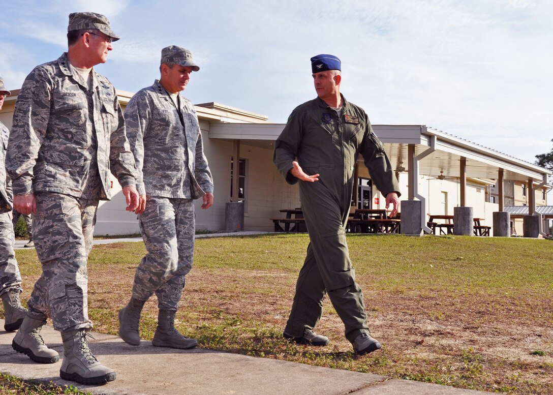 From left, Lt. Gens. James F. Jackson, chief of the Air Force Reserve and commander, Air Force Reserve Command, and Eric Fiel, commander of Air Force Special Operations Command, tour facilities at Duke Field, Fla., Dec. 20, 2012, led by Col. Andy Comtois, 919th Special Operations Wing commander.  The generals were updated on the status of the wing’s ongoing transition to its new aviation foreign internal defense mission.  (U.S. Air Force photo/Dan Neely).