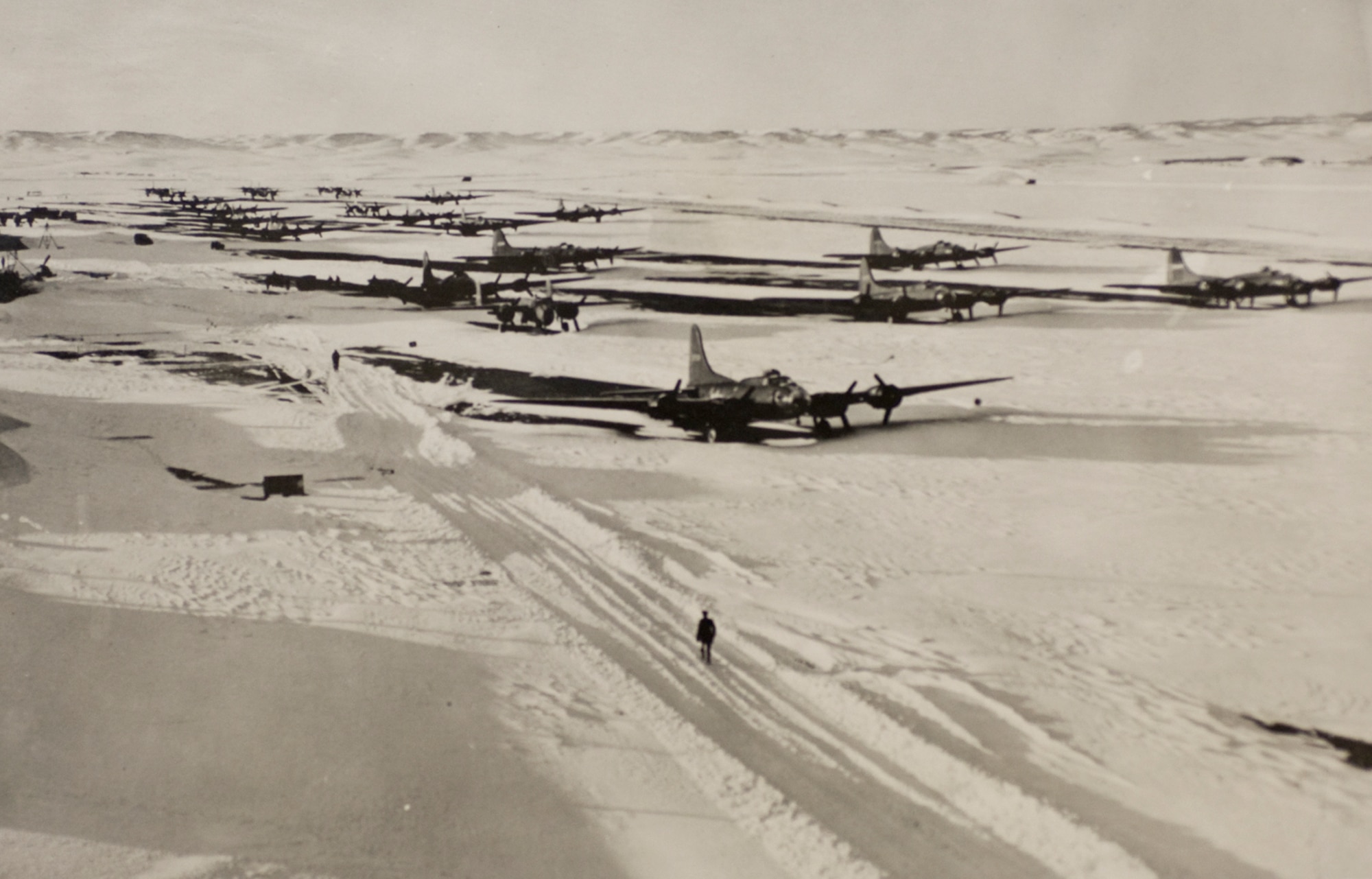 B-17s park in the snow on Rapid City Army Air Field, S.D.   Winter weather has posed a challenge for aircrews and maintainers at the base, later renamed Ellsworth Air Force Base, since it first opened Jan. 2, 1942. (Official U.S. Air Force courtesy photo/Released)
