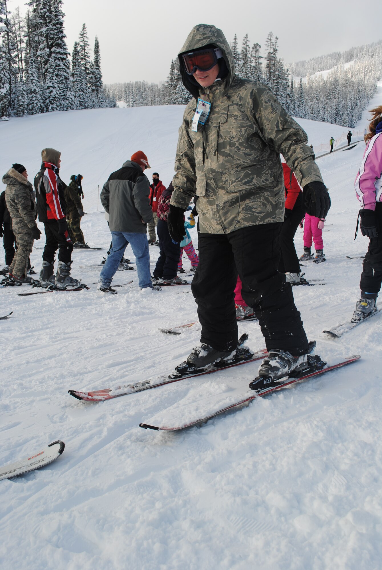 Airman Taylor Franklin, 341st Communications Squadron member, practices shuffling up a hill during a free ski lesson at Showdown Ski Area. Franklin, a native of Ashtabula, Ohio, took advantage of a free ticket, rentals and lesson that came with Military Appreciation Day at showdown as this was her first time on skis. (U.S. Air Force photo/Airman 1st Class Katrina Heikkinen)