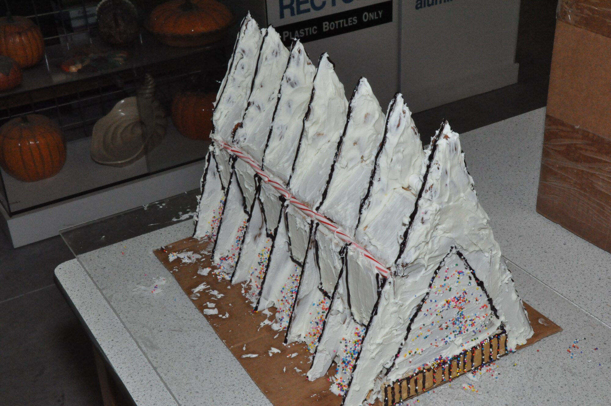 GOODFELLOW AIR FORCE BASE, Texas – The 17th Civil Engineer Squadron competes in a gingerbread house contest held at the Arts and Craft Center here Dec. 19. Judging of the houses was decided on how much money each individual house collected, which is then used for a pizza party for the winner. (U.S. Air Force photo/ Airman 1st Class Joshua Edwards)