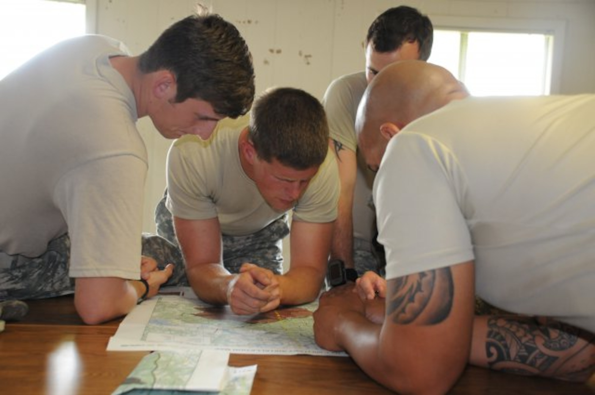 AWALP students work together to evaluate the information they gathered earlier in the day. (U.S. Army courtesy photo/Released)
