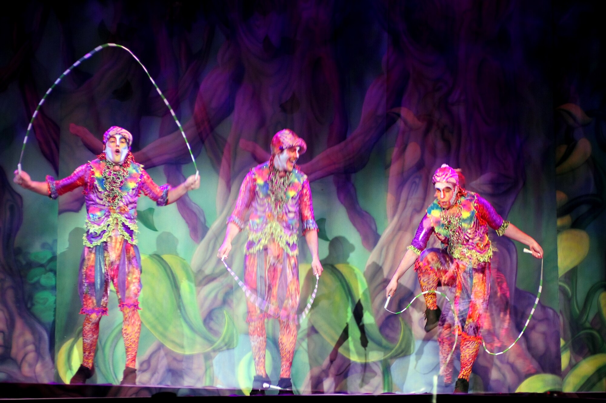 Members of Team Ramstein waited an hour in the cold for a warm seat to view Cirque Dreams "Jungle Fantasy” World Tour performance at Ramstein Air Base, Germany, Feb. 17, 2012.  The hour and a half show featured vibrant costumes, amazing acts of physical strength and skill, aerial acts, tumblers, jugglers, gymnasts, contortionists and jokesters. Cirque Dreams partnered with Armed Forces Entertainment to perform "Jungle Fantasy" at 17 military installations in 10 different countries through Asia and Europe.  (U.S. Air Force photo/Senior Airman Aaron-Forrest Wainwright)