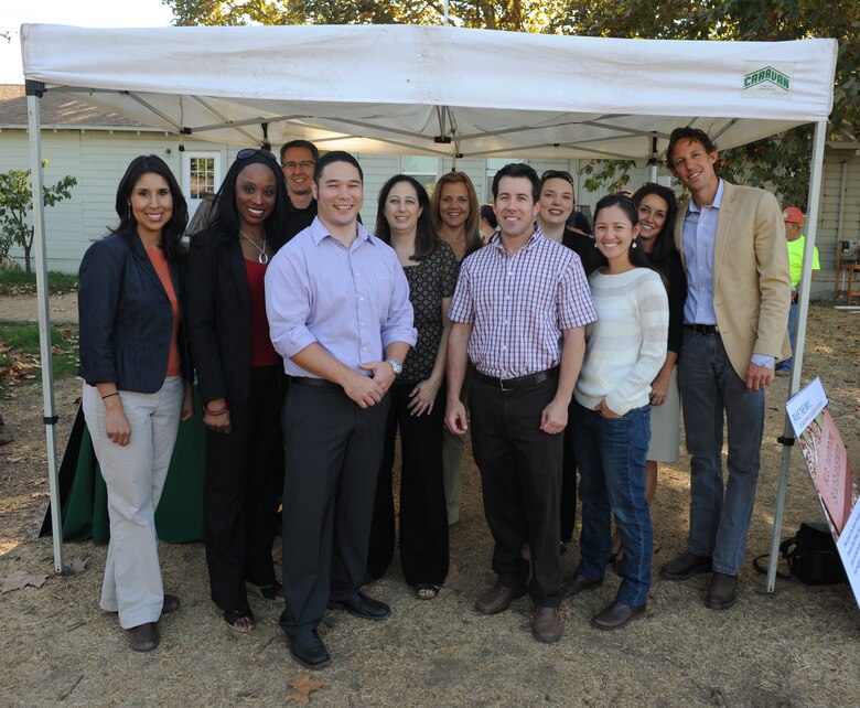 Kim Carsell (fifth from left), planner with the U.S. Army Corps of Engineers, celebrates the ground breaking of her Leadership Sacramento class’s community service project at Soil Born Farms in Rancho Cordova, Calif., Oct. 18, 2012. The group planned, funded and built an outdoor amphitheater for the non-profit agriculture education group within one year. (Photo courtesy of Kim Carsell)