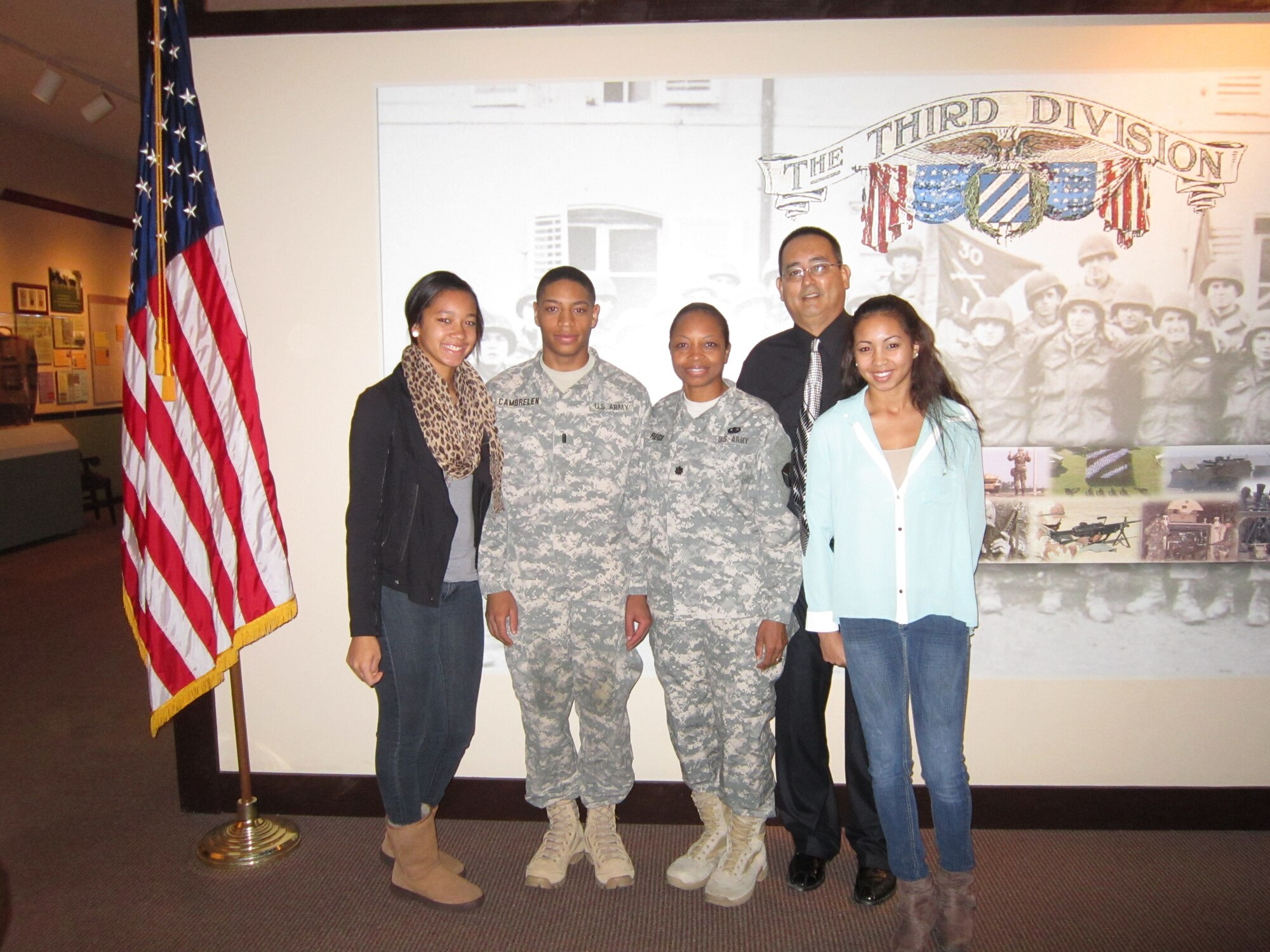 Lieutenant Col. Anna Rego and family at a promotion ceremony for her son, Harry Cambrelen. (Photo courtesy of the Rego family)