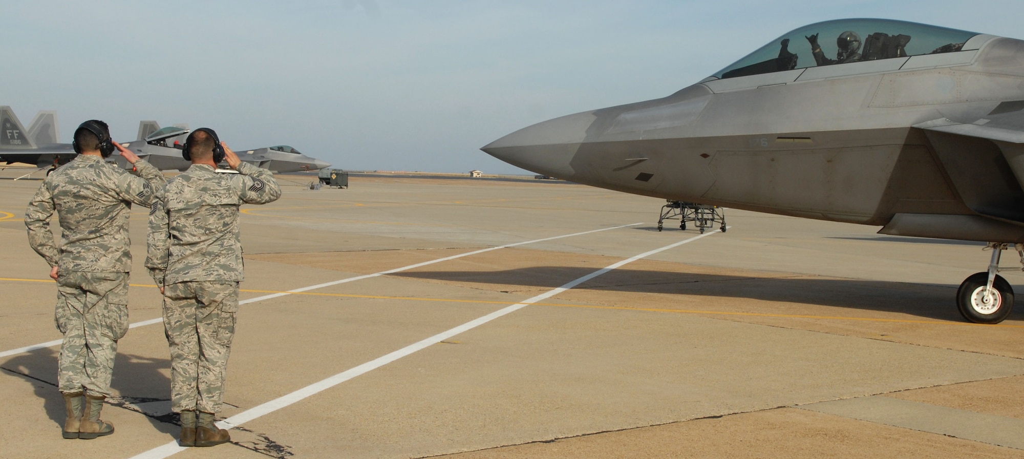 Capt. Patrick Williams, Air Force F-22 Raptor demonstration pilot, taxis onto the runway for takeoff at Langley Air Force Base, Va., Nov. 30. Before the demo team goes on tour, the incoming pilot undergoes extensive training with the help of the former pilot. (U.S. Air Force photo by Airman 1st Class Austin Harvill/Released)