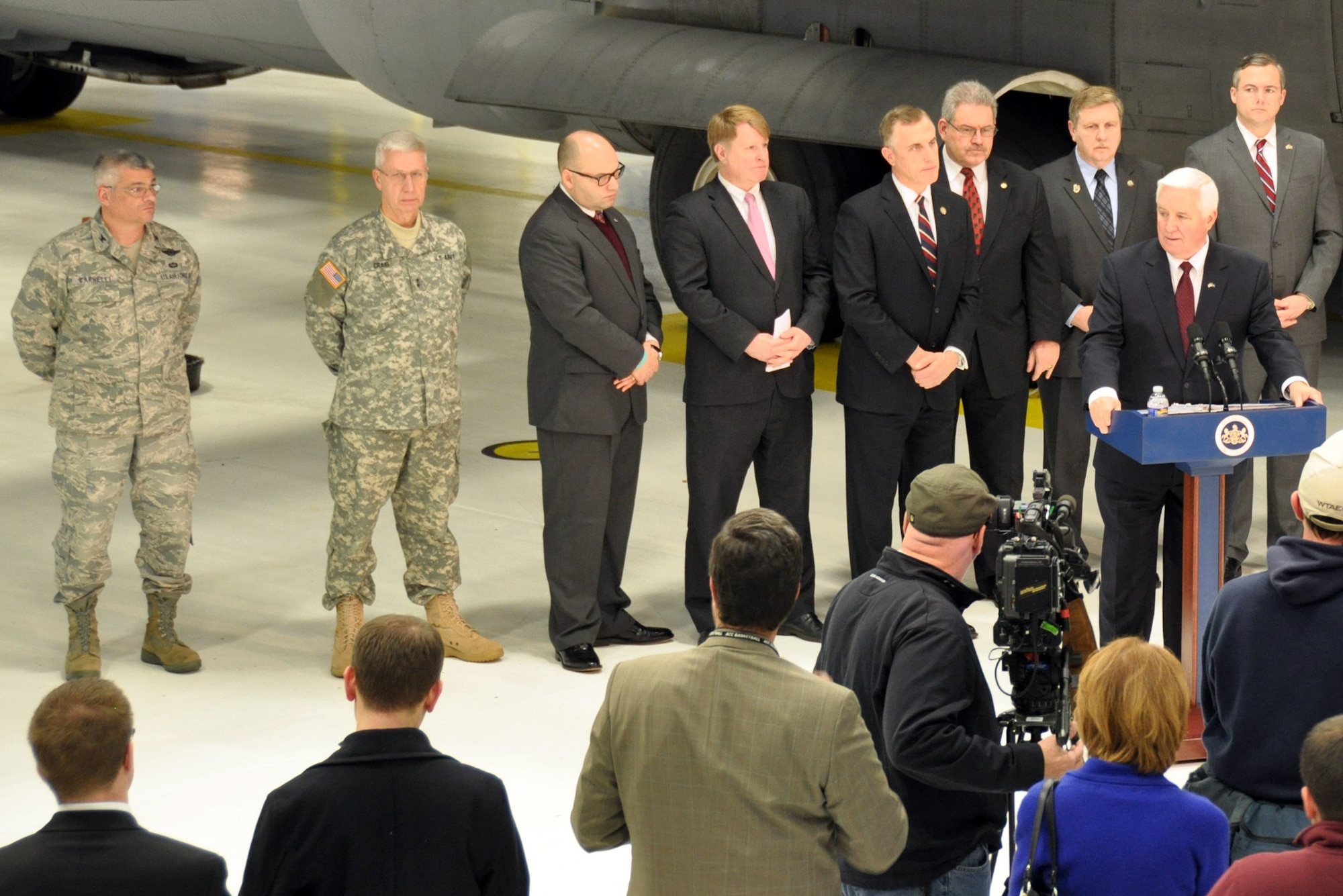 Col. Craig C. Peters, commander of the 911th Airlift Wing, hosts Pennsylvania state Governor Tom Corbett, at the Pittsburgh International Airport Air Reserve Station, Dec. 28, 2012. At the conclusion of the Wing mission brief, the governor held a press conference which also included numerous federal and state elected officials.  Corbett began the press conference acknowledging the recent loss of military advocate and Pittsburgh Airport Area Chamber of Commerce president, Ms. Sally Haas, and asked the audience for a moment of silence for her contributions to the region.  Corbett then went on to address the base’s strategic importance both globally and for the state of Pennsylvania. (U.S. Air Force photo by Senior Airman Joseph E. Bridge/Released)