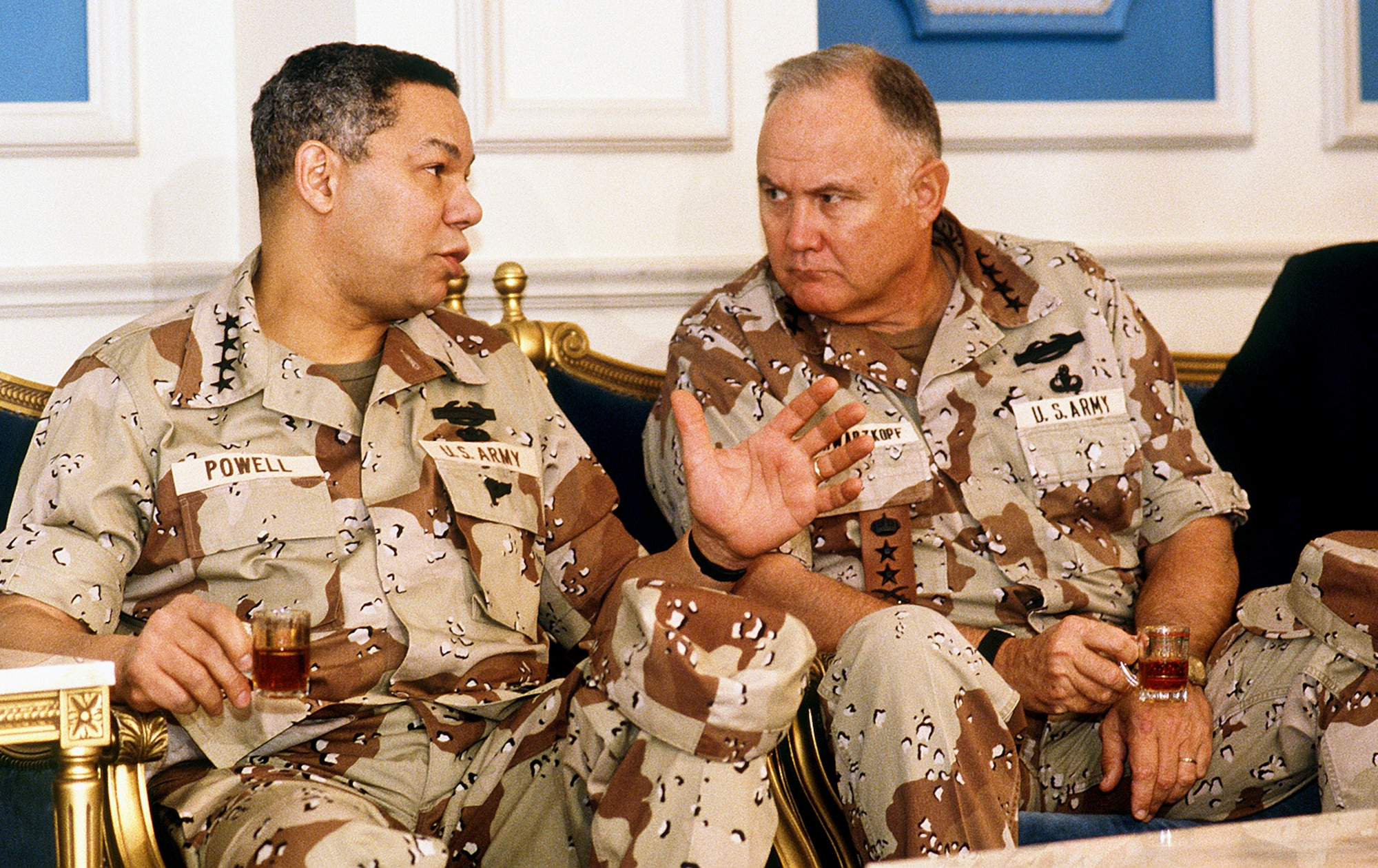 Army Gen. Norman H. Schwarzkopf consults with then-Chairman of the Joint Chiefs of Staff Gen. Colin Powell in a meeting regarding the Allied military coalition in Operation Desert Shield. Schwarzkopf, the commander in chief of U.S. Central Command during Desert Shield and Operation Desert Storm, died Dec. 27, 2012, at the age of 78. (U.S. Air Force photo/Tech. Sgt. H. H. Deffner)
